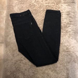 Black jeans with cutout knees